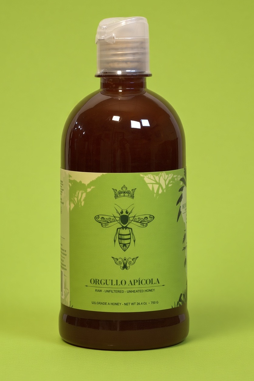 A round squeeze bottle of amber honey with a sage label and a crowned bee
